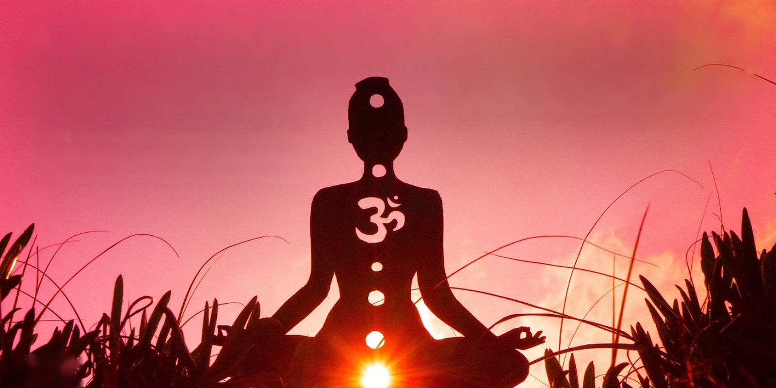 Silhouette of a meditating figure with an Om symbol and glowing chakra points against a pink sunset sky, Living with Reality Ep. 55 Kundalini Awakening